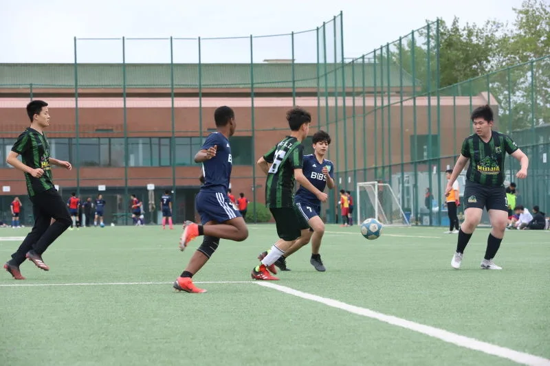 Players from Beijing Huijia High School during a football match